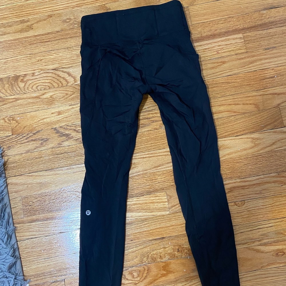 Lululemon black leggings size 4
